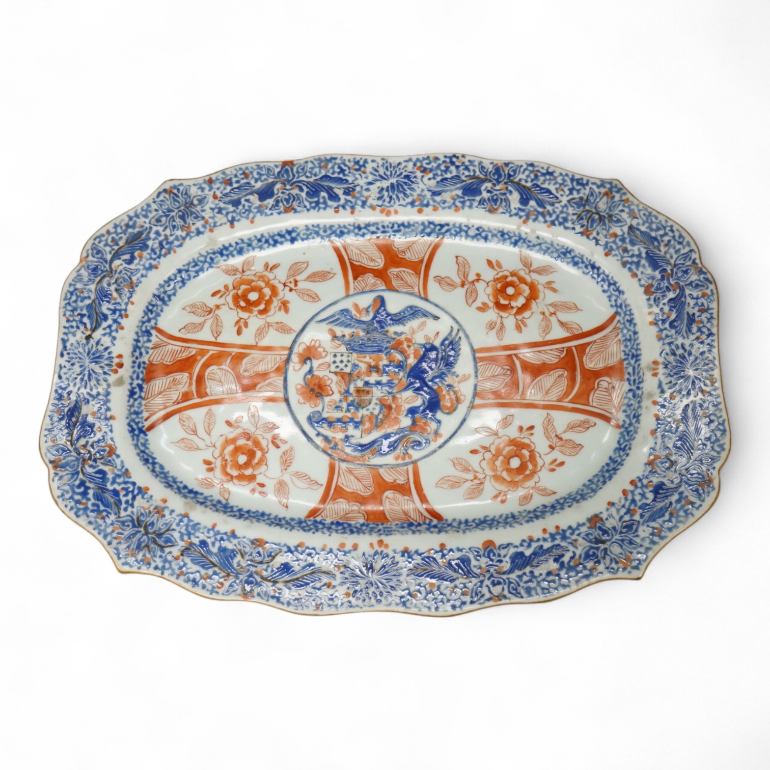 A Chinese export armorial dish, 18th century, possibly Dutch decorated, 33cm wide